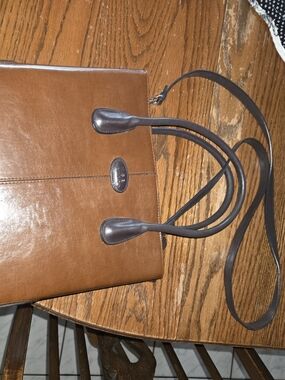 Structured Brown Leather Tote with Dark Trim and Shoulder Strap